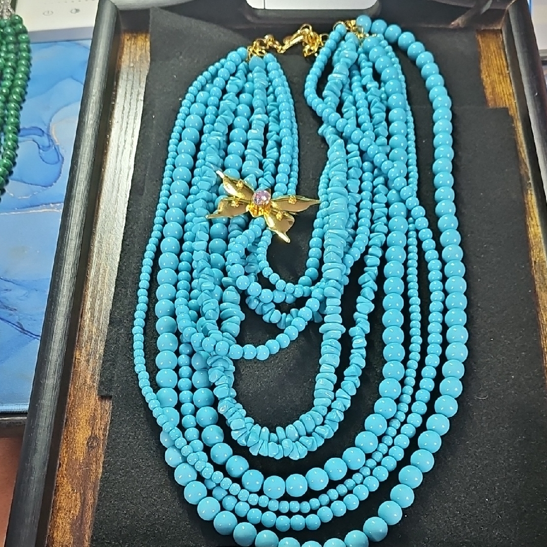 Sassy Jones Turquoise Necklace With Gold Floral Accent
